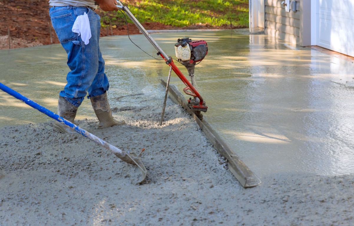 Concrete finishing work for retaining wall construction